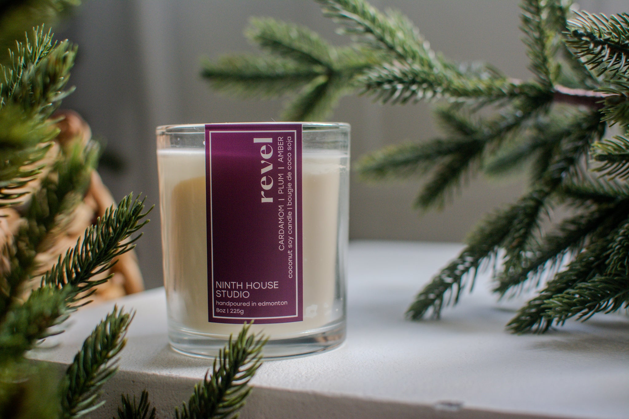 Revel Candle | Cardamom • Plum • Amber